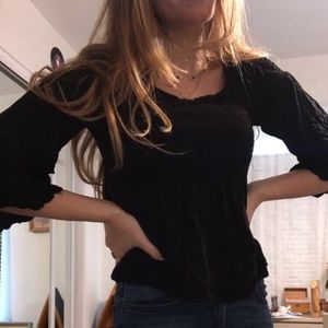 Flowy black top with floral embroidery